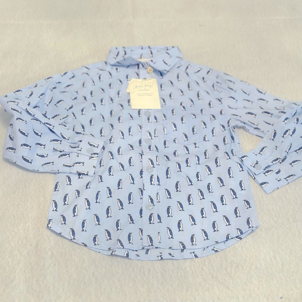 Brand new with tags, Rachel Riley boys penguin shirt. Size 6.